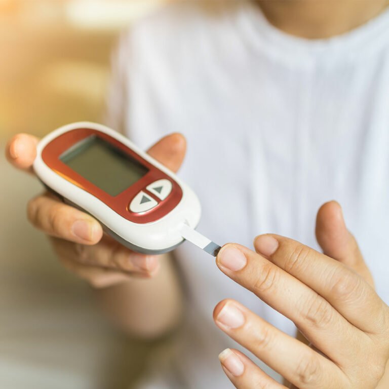 Closeup of person taking their blood sugar level